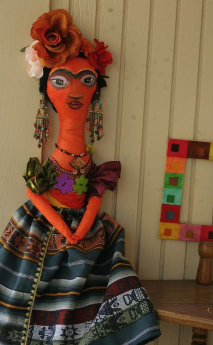 Frida Kahlo, painted rag doll in custom-designed and tailored clothes. by Julia Kosivchuk